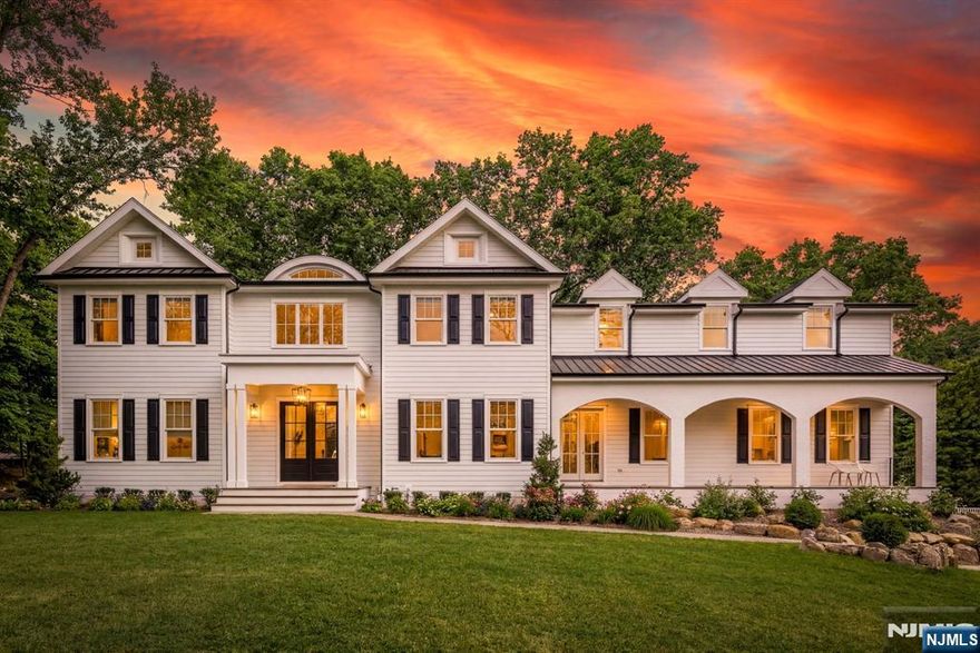 Discover an exceptional opportunity to own this pristine, newly built Colonial in the prestigious Sicomac section of Wyckoff. This residence blends timeless architecture with curated finishes and superior craftsmanship. A grand interior welcomes you with soaring ceilings, white oak floors, and sunlit living spaces designed for both everyday comfort and elegant entertaining. The designer kitchen serves as the heart of the home, featuring warm wood ceiling beams, custom cabinetry, and a seamless flow into the casual dining area and inviting family room with built-ins, a gas fireplace, and refined lighting. Thoughtful details abound, from lime-wash walls to bespoke millwork. The serene primary suite offers a custom walk-in closet and spa-like bath, while all bedrooms include en-suite baths. A flexible first-floor office or guest suite adds convenience. The finished lower level provides a gym, full bath, recreation space, and storage. A 3-car garage with 20-foot ceilings allows for lift potential. Enjoy indoor-outdoor living on a covered rear porch overlooking a private half-acre lot in one of Wyckoffâ€™s most sought-after neighborhoods.