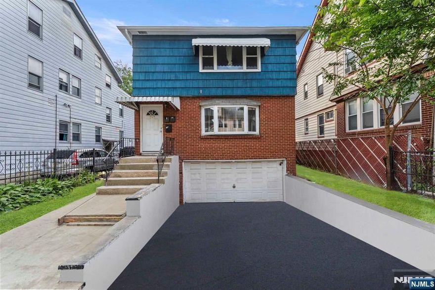 Welcome to this exceptional two-family home in the heart of Newark! Featuring a total of 6 bedrooms and 2 bathrooms, each unit offers 3 spacious bedrooms and 1 full bathroom, with the potential to add a 4th bedroom in both units, increasing rental income opportunities. With hardwood floors throughout, this property exudes a warm and inviting ambiance. The forced heat ensures comfort during the colder months, while the two attached driveways provide ample parking space for residents and guests alike. Whether you're looking to invest or seeking a multi-generational living solution, this home is a perfect fit. Don't miss out on this incredible opportunity schedule your viewing today!