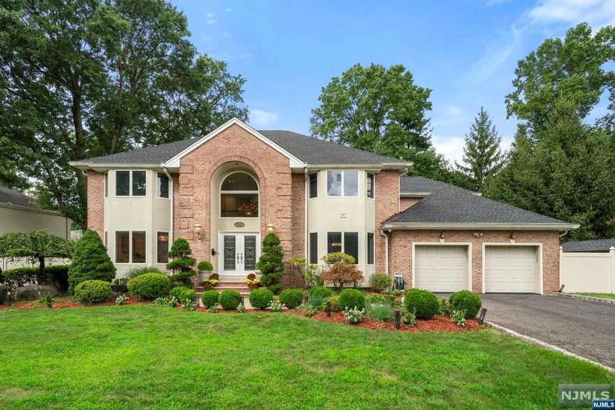 Welcome to this exquisite Colonial manor nestled on Closter's prestigious East Hill. This beautifully maintained home has had renovation and more updated 2024. Offers luxurious living spaces approximately 5300sqft includes basement. Featuring a grand two-story entry foyer, marble floor all around 1st floor, gourmet kitchen with Quartz countertops, subzero refrigerator, Thermador Range, radiant kitchen floor and full size laundry room. The main level boasts custom crown molding, family room W/fireplace, bright living room, dinning room, and guest suite with a full bath. Upstairs, the primary suite includes a sitting area, en suite Jacuzzi bath with a skylight, 2 additional bedrooms, w/Jack&Jill and 1 bed room with own en suite. The finished walkout basement leads to a private fully enclosed beautiful backyard, perfect for entertaining, includes a summer kitchen, high-ceiling with family/play/exercise/ office room and a full bath. New LED lights installed throughout the house.