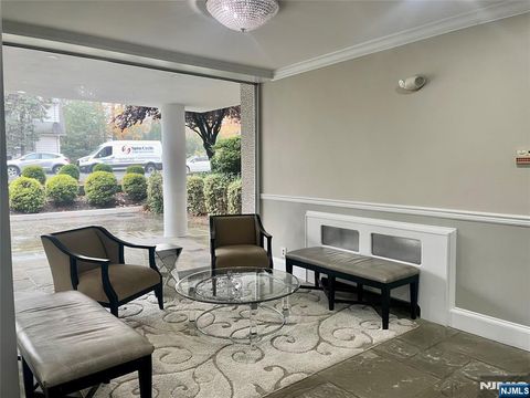 Photo of 88 Clinton Pl #A7, Hackensack, NJ 07601 (MLS # 25038763)