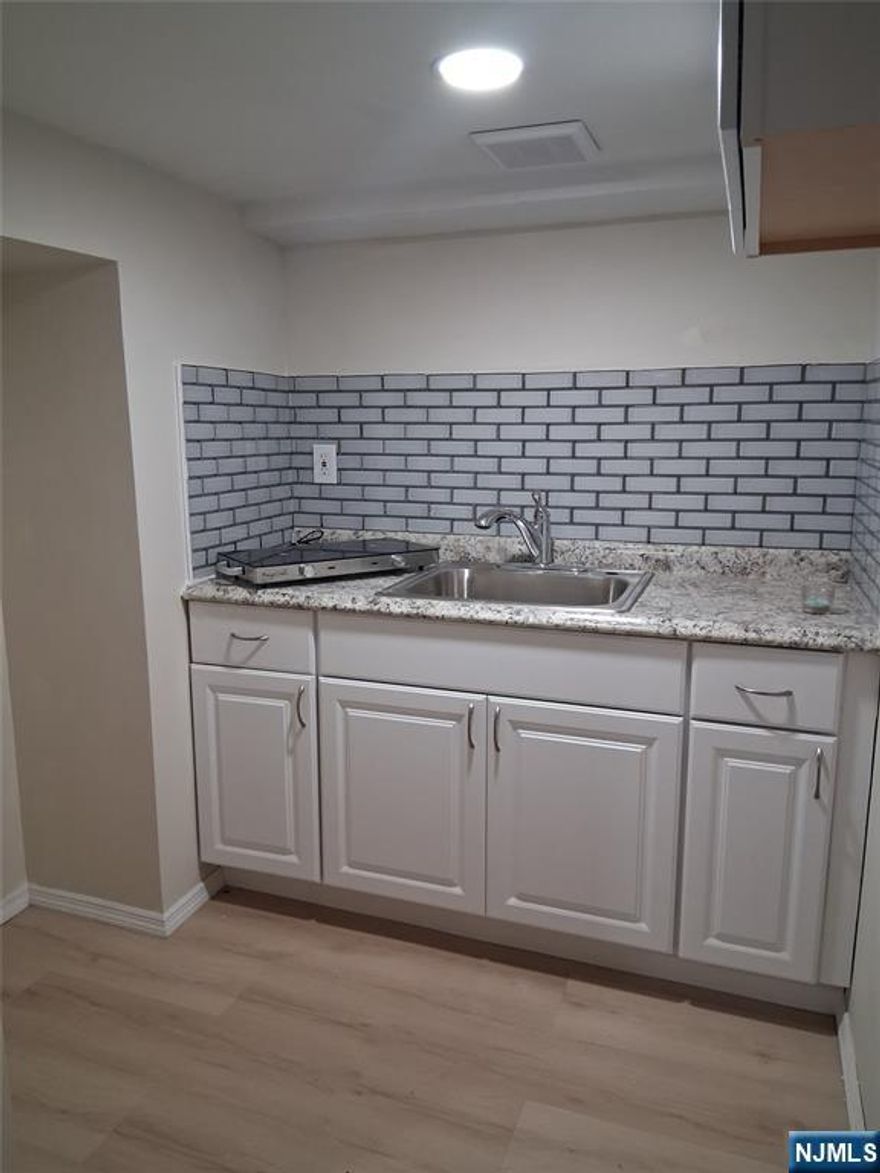 Ground Floor Studio with one room, Kitchen, and Full Bath