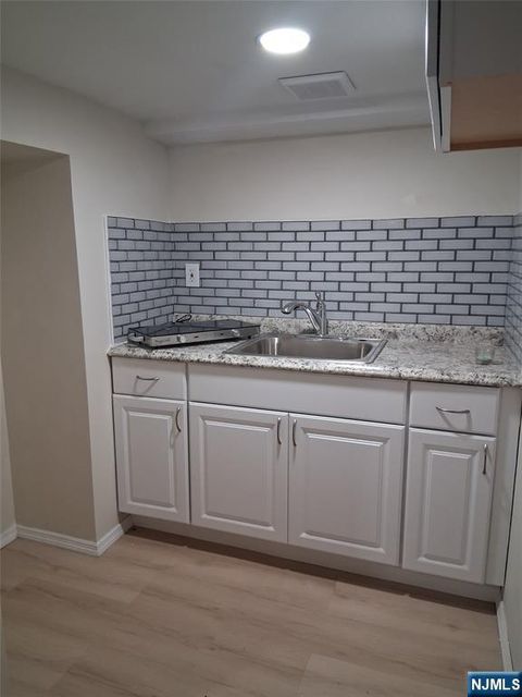 Photo of 4 Plymouth Rd #Ground Floor, Paterson, NJ 07502 (MLS # 25041544)