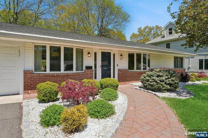 Meticulously maintained and beautifully updated, this exceptional Ranch-style residence offers timeless appeal. Rich hardwood floors flow throughout, while the inviting living room opens through sliding doors to a patio and private backyard oasis. The galley style eat-in kitchen is thoughtfully renovated with stainless steel appliances and refined finishes. A serene primary suite features an updated ensuite bath and dual closets for added comfort and convenience. Recent upgrades, including a new HVAC system and newer roof, provide peace of mind, while the generous patio and spacious fenced backyard create the perfect setting for outdoor entertaining and relaxation. This home truly has it all.