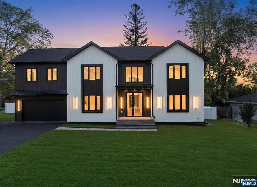 This new construction 6 bedroom, 5.5 bathroom home is a masterwork of scale, sophistication, and thoughtful design. From the moment you enter, the home commands attentionâ€”a double-height foyer anchored by a dual sided fireplace and airy interiors bathed in natural light. 10 foot ceilings enhance the open flow from formal living spaces to the gourmet chefâ€™s kitchen, where Wolf and Sub-Zero appliances, genuine marble counters and backsplash, and pantry with wet bar invite both intimate gatherings and grand celebrations. Six bedrooms and five full baths ensure privacy and comfort, while dedicated spacesâ€”a private office, gym, home theater, and family roomâ€”offer a lifestyle of convenience. The primary suite features generous closets, spa bath with dual vanity, soaking tub, shower and water closet. Every detail speaks to craftsmanship, from custom millwork to commercial-grade soundproof windows that cocoon the home in a quiet elegance. Outdoors, a covered patio overlooks the professionally landscaped backyardâ€”an inviting place for al fresco dining or slow mornings with coffee in hand. Situated in one of the areaâ€™s most convenient locations for access to all major highways, shopping, and dining. This is more than a home; it is a statement of refined living, perfectly tailored for those who seek beauty, comfort, and enduring value.