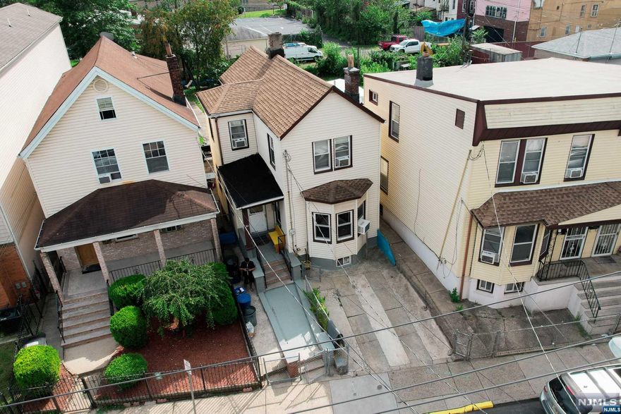 Beautiful single family residence METICULOUSLY cared for. Bathroom redone and Kitchen upgraded. Three large bedrooms, plenty of closet space. Unfinished basement with laundry room. Large Back Yard GREAT FOR ENTERTAINING FRIENDS & FAMILY. One car parking space in front of the house. A MUST SEE!!!