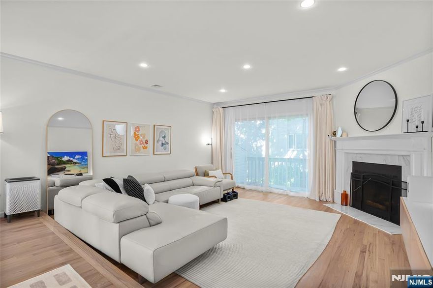 Welcome to this bright and spacious three-story townhouse in the heart of Fort Lee! This beautifully renovated 2 bedroom 3.5 bathroom duplex-style condo just over 2000sqft has everything you need. The main level features a large living room with a cozy fireplace, a separate dining area, and a modern kitchen with quartz countertops, stainless steel appliances, and a sleek hoodâ€”all updated recently. The lower level offers a versatile family room that can easily be used as a third bedroom, home office, or extra hangout space with an extra full bathroom! The home also has three heating zones and newer furnaces. Plus attached garage and driveway. Youâ€™ll love the convenience of this locationâ€” just minutes to the George Washington Bridge, major NJ highways, schools, parks and hiking trails. Plus, transportation, shopping, and plenty of great restaurants are all nearby.