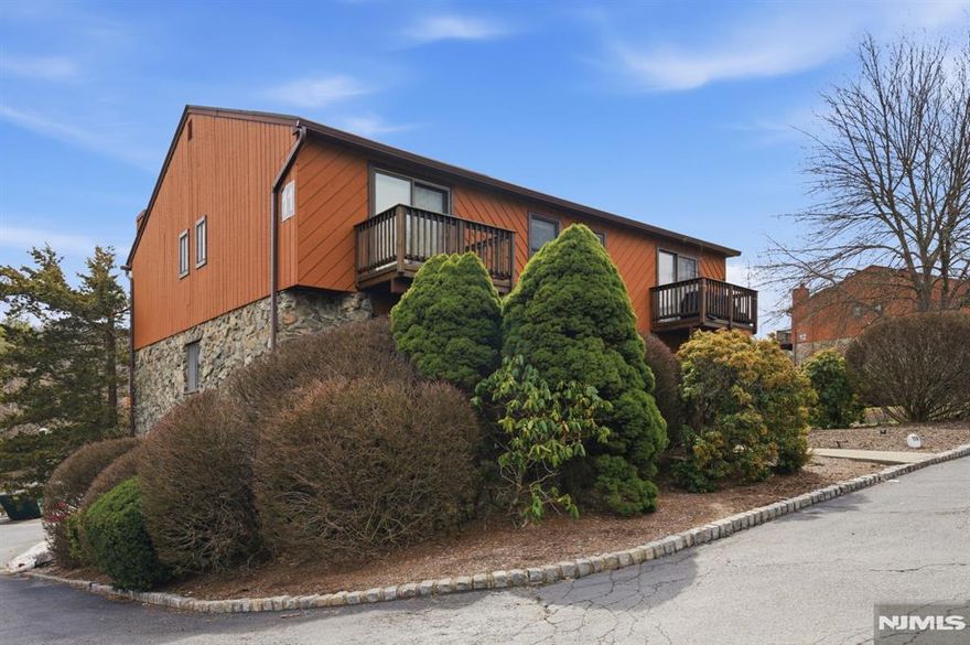 Welcome to this lovely multi-level townhome in Brookside Heights, just waiting for you to make it your own! The first floor consists of a kitchen, dining room, half bathroom and a spacious living room featuring a cozy stone fireplace complete with sliding glass doors that lead to a private balcony. The second floor offers a generously sized bedroom with 2 large closets, sliding glass doors leading to the balcony and beautiful ensuite full bathroom. A second very large bedroom with 2 large closets and 2 sliding glass doors leading to the balcony in addition to another ensuite bathroom completes the second floor. The walkout basement is finished and provides a wonderful flexible space that can easily be used as a recreation room, home office, or additional living area. It also includes a storage area, laundry, half bath, and direct access to the attached 1 car garage. Residents of this welcoming community enjoy amenities such as inground pool, plenty of parking, and a pet-friendly atmosphere. Ideally located close to schools, shopping, dining, and public transportation offering both comfort and convenience in a great location.