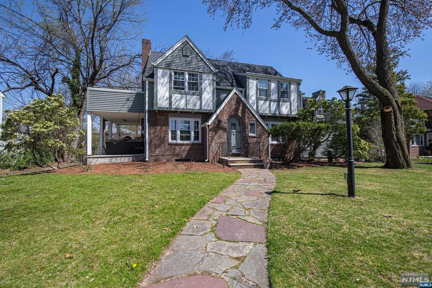 Welcome to this charming and unique Victorian Tudor. This stunning home features; 4 beds 3.5baths,Hardwood floors, Working fireplace, Two outdoor decks, Enormous lot over 15,300 square ft Perfect back yard for entertaining .Attached oversized garage Full walk up attic with also renovated bathrooms and kitchen! Finished basement with wet bar. Conveniently located across a gorgeous park and just minutes from George Washington bridge; making commuting to the city a breeze.