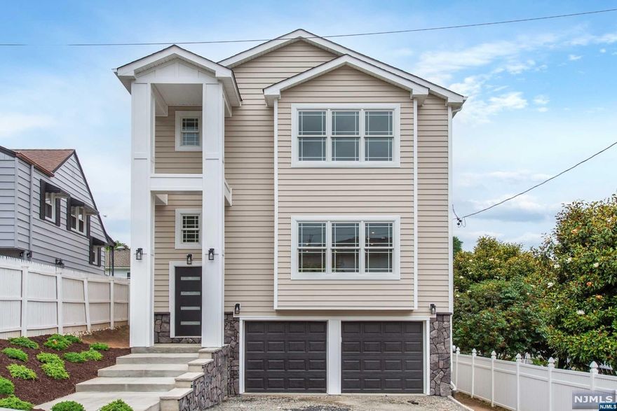 BRAND NEW Construction Home! This beautiful space includes 3 bedrooms with walk-in closets, and 3.5 baths. The kitchen has elegant natural stone countertops and professional appliances. Finished walkout basement! Features include 2 car garage, mud room, remote controlled fireplace, and laundry room. Low tax town & close to city transportation! Taxes TBD