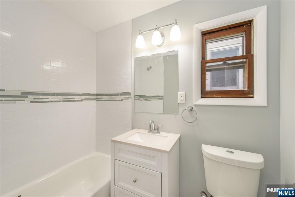 Photo of 46 Center Street, Clifton, NJ 07011 (MLS # 26005139)