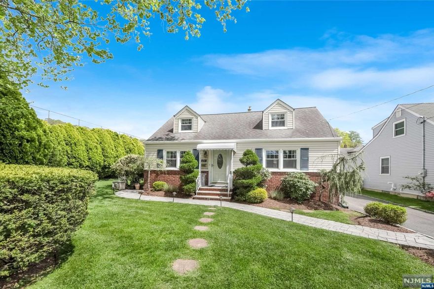 Welcome to this beautiful home in the Country Club section of Teaneck. The first floor of the home features a living room, a beautifully renovated Eat in Kitchen with stainless steel appliances & ample counter space, dining room area, primary bedroom, an additional bedroom, and a full bathroom. On the second level you will find two additional bedrooms and another full bathroom. The basement was fully renovated and is perfect for entertaining, with two different sections, a beautiful full bathroom, as well as laundry, storage, and utilities. Additional features include Central A/C, a beautiful and large side yard, an outdoor patio area, a large one car garage, and a nice long driveway. The home is located on a dead end street, and is close to parks, schools, shopping, and transportation into NYC.