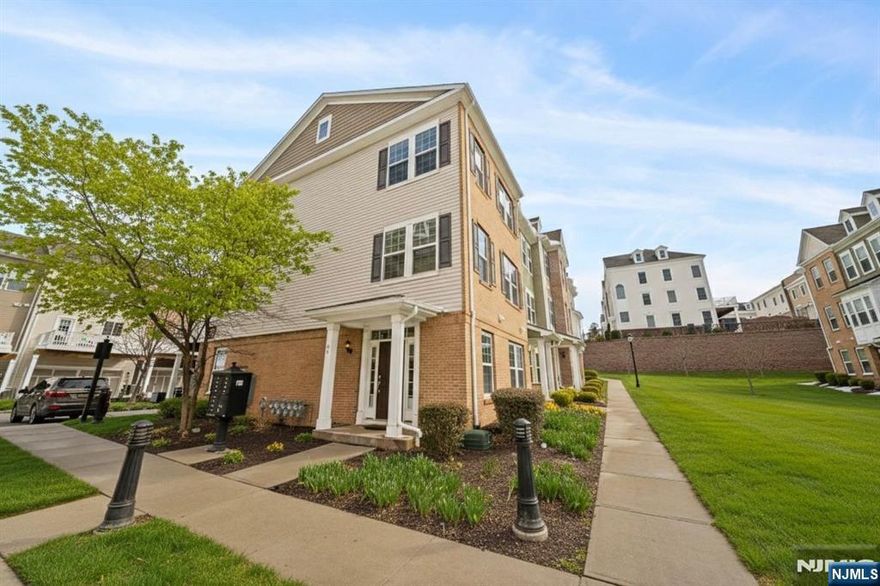 Call Mital Kataria at 732-789-0670 to schedule a tour. Welcome to this magnificent END UNIT 4 bedroom, 3.5 bath townhome that offers immense sunlight with extra windows! Experience a sleek & chic interior featuring an open floor plan. Get welcomed by the landscaped courtyard overlooking from the home. 1st floor offers bedroom with full bath - perfect for guests or home office set up. 2nd Floor features modern Living & Dining room, Kitchen with gorgeous customized cabinets with QUARTZ countertops, Chef Kitchen APPLIANCES & huge center Island, outdoor deck, upgraded hardwood floors on all level, huge pantry and much more. Head upstairs into an INCREDIBLE master suite featuring walk-in CLOSET & Master Bath with standing shower & Jacuzzi, Bedrms 3 & 4 with Bath 3 ! Conveniently Located From NJ Transit Train & Bus Stops For Easy Commute to city. Bonus features - two zone thermostat, in-built ceiling speakers, Lift master MyQ app controlled garage door w/ 2 car garage + driveway and much more.