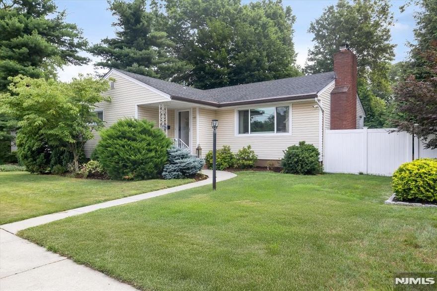 This updated Ranch in Township of Washington is the perfect blend of comfort, space, and location. Featuring 3 bedrooms and 2.5 baths, the home welcomes you with a spacious living room highlighted by a fireplace and gleaming hardwood floors. The dining room is bright and inviting thanks to a large picture window, while the eat-in kitchen showcases cherry wood cabinetry, stainless steel appliances, and convenient access to a backyard patio; ideal for outdoor entertaining. The primary bedroom includes a half bath and generous closet space. The finished lower level provides an expansive rec room, a full bath, and a walkout to the fenced yard. Updates include newer roof, windows, siding, electric, and central air. Enjoy life in a quiet neighborhood with close proximity to public transportation to NYC, major highways, shopping, restaurants, schools, parks, and golf!