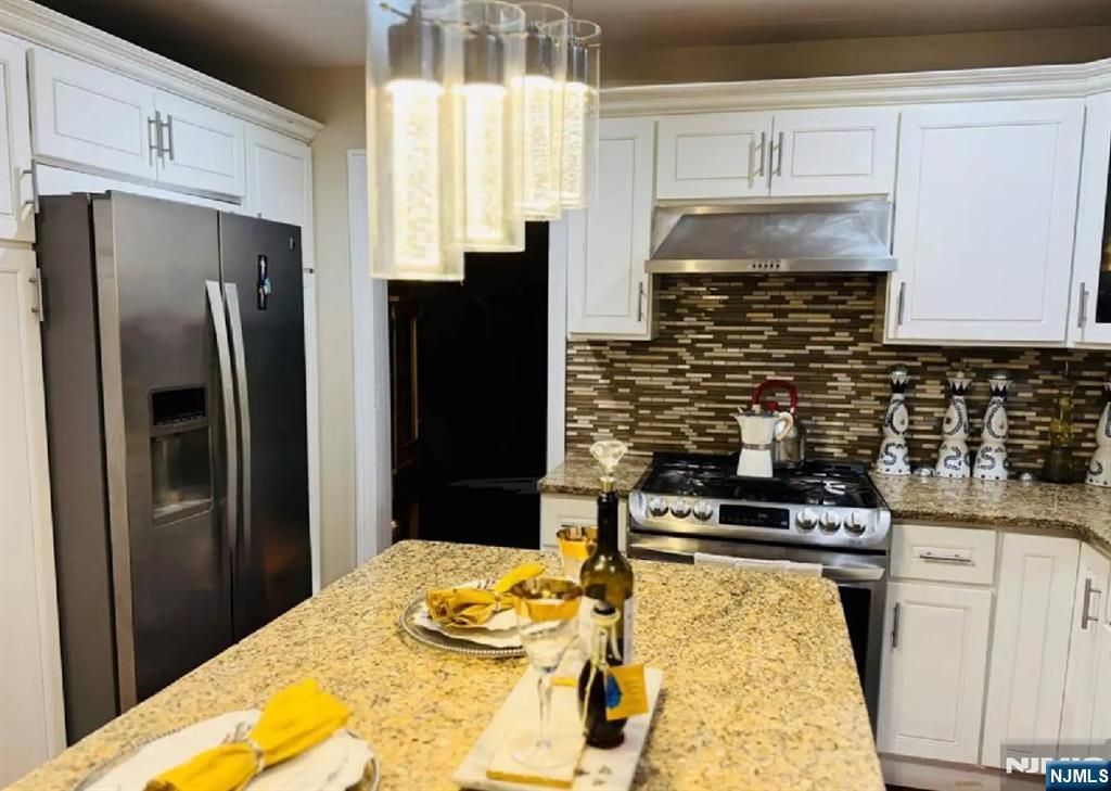 Photo of 419421 19th Avenue, Paterson, NJ 07504 (MLS # 26004772)