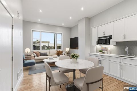 Photo of 12 Dempsey Ave #A, Edgewater, NJ 07020 (MLS # 25043768)