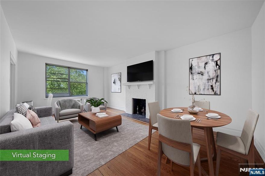 Call Wendy Gamez at 917-504-3347. Dwight Manor sits in the highly desirable East Hill of Englewood, where rare opportunities like this donâ€™t come often. Donâ€™t miss your chance to own this well-kept 2-bed, 1-bath penthouse-level residence. With low carrying costs ($590.03 HOA & $7,750.11 annual taxes), itâ€™s ideal for both investors and end-users. Unit B51 features east and west exposures, filling the home with natural light and offering sunset views from fall through spring. Highlights include: a wood-burning fireplace, wood inlay flooring, and a warm, functional layout perfect for entertaining. The oversized primary bedroom offers 2 closets, 1 cedar-lined, plus great storage throughout. The kitchen is fully equipped with a gas range, dishwasher, microwave, refrigerator, and generous cabinetry. Included in the HOA: 1 outdoor parking space(#15), water, heat, common area upkeep, and access to on-site gym. A deeded garage is optional (additional cost). Just 7 minutes to the GWB, with NJ Transit nearby and downtown Englewood at your doorstep, this location offers unbeatable convenience. Located on the lobby level for easy access, the building also features a card-operated laundry room and well-maintained common areas. This isnâ€™t just a home, itâ€™s a rare opportunity to own in one of Englewoodâ€™s most sought-after neighborhoods.