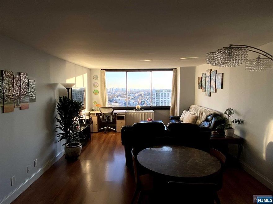 Bright high floor south facing 1 bedroom apartment with direct southern views from the NYC skyline to the Meadowlands. Two large walk-in closets, newer kitchen and bathroom and a large living room/dining combo. The large bedroom has an additional closet. Refinished ceilings and will be freshly painted. Wooden floors throughout with bedroom floor being done prior to taking occupancy. Amenities: 24-hour security/concierge, gym, outdoor pool, sauna, game room, platform tennis, pickleball, storage, and on-floor laundry room. Close to shopping. NYC transportation at your doorstep! Heat/hot water, utilities, basic cable, high speed internet, and 1 covered parking are included! No smoking inside the unit. A small dog may be considered with additional rent. Tenant insurance is mandatory.