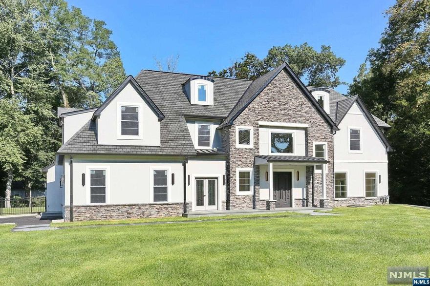 OPPORTUNITY KNOCKS! One of a kind architectural masterpiece - The Epitome of Luxury! GPS USE 87 Valley View Terrace! CUSTOM new construction Colonial Manor Home move-in ready. PRIVATE CuldeSac, coveted West Side of Montvale, private, peaceful escape! Stunning architecture, uncompromising quality! 5200 Sq.ft. plus 2000 SF lower lvl. Distinguished by 6 bedrooms, one on the main and five upstairs, 4 full and one half baths with extended family opportunity. Truly a trophy property w/open floorpln perfect for grand entertaining & comfortable living. Grand 2 story entry, soaring ceilings, postcard views, flooded with natural light. Delivered to you with expansive property & privacy will make your outdoor living dreams a reality! An exquisite living experience in the heart of Montvale with top rated schools, FAB shopping and EZ NYC Commute! All this and more in a desirable community. Check out our Special Features & Amenities and come tour this home at an attractive new price!