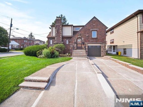 Photo of 490 Ridgefield Ter, Fairview, NJ 07022 (MLS # 26041132)