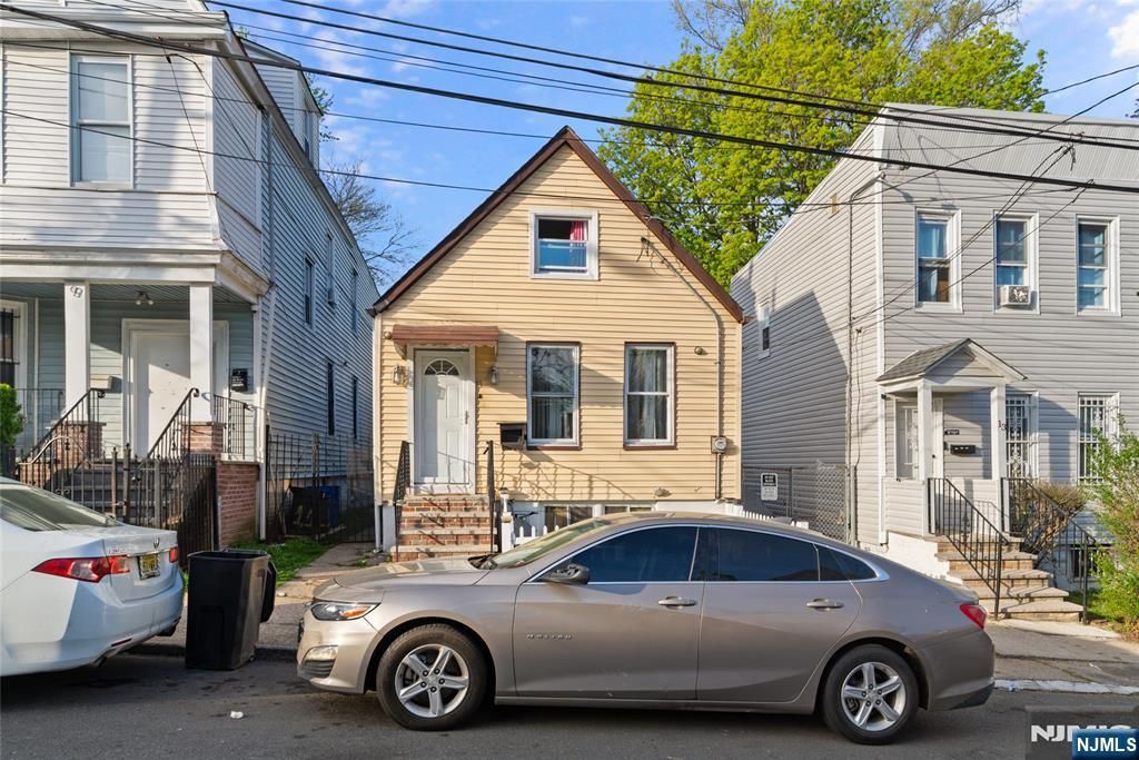 Photo of 11 Tichenor Terrace, Irvington, NJ 07111 (MLS # 26013876)