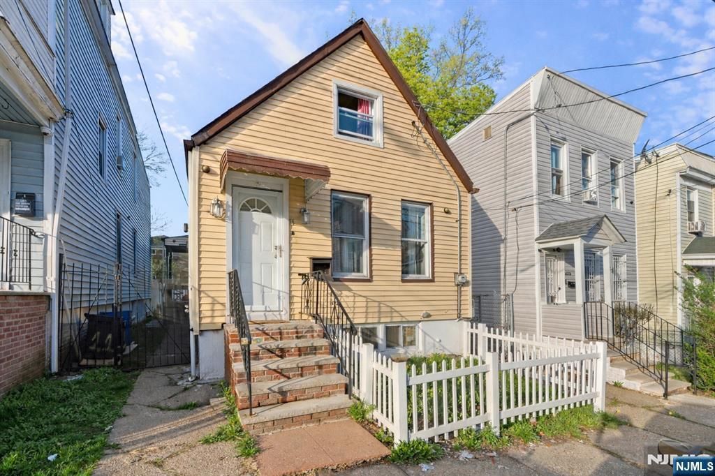 Photo of 11 Tichenor Terrace, Irvington, NJ 07111 (MLS # 26013876)