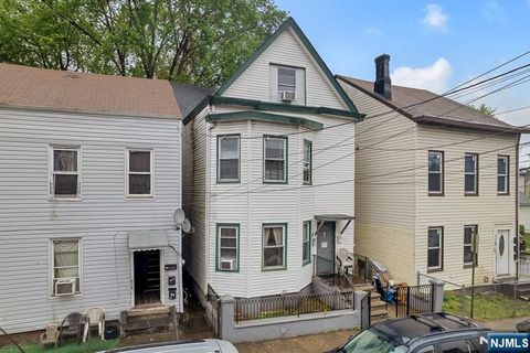 Photo of 124 Main Street, Paterson, NJ 07522 (MLS # 25028007) Photo of 124 Main Street, Paterson, NJ 07522 (MLS # 25028007)