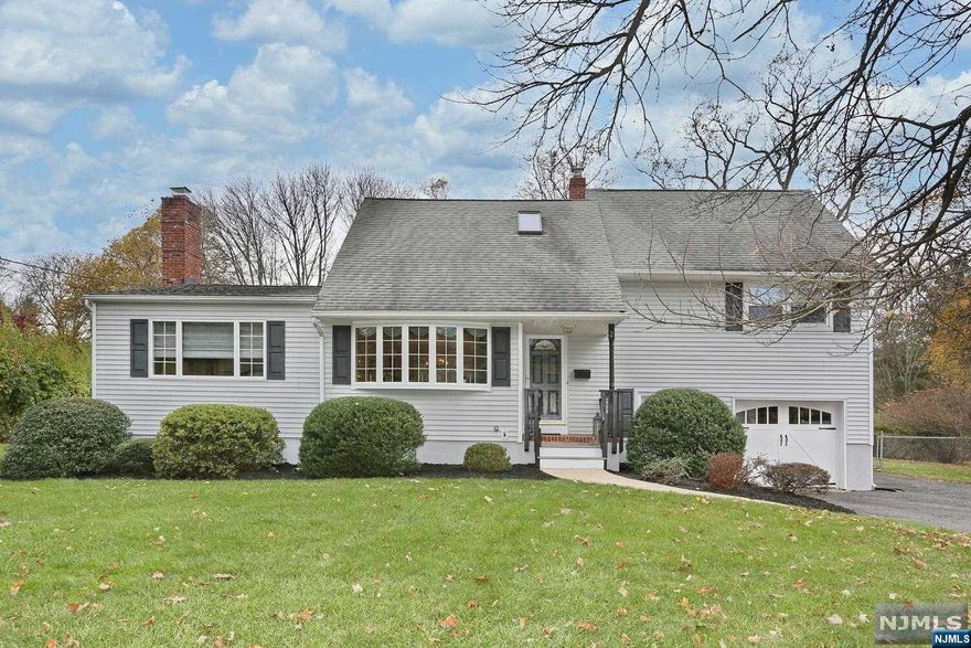 OPEN HOUSE SATURDAY DEC. 9 11:00-1:00. This is not your typical split level! Many unique features make this a one of a kind home. One of the stand out features is a main level family room addition. The front to back family room addition offers so much extra space and makes this home a rare find. Another crowd pleaser is the open floor plan. The wall has been opened up between the kitchen and dining area. The master bedroom is spacious. No tiny bath here! Enjoy a huge bathroom with tub, shower stall and double sinks. The main bath is updated and the whole house is in move in condition. The beautiful yard boasts privacy from the neighbors, a heated inground pool, huge recreation space and large deck. Close to middle school and high school (approximately .4 miles). Waldwick offers train and bus to New York City and accessibility to Routes 17 and 208.