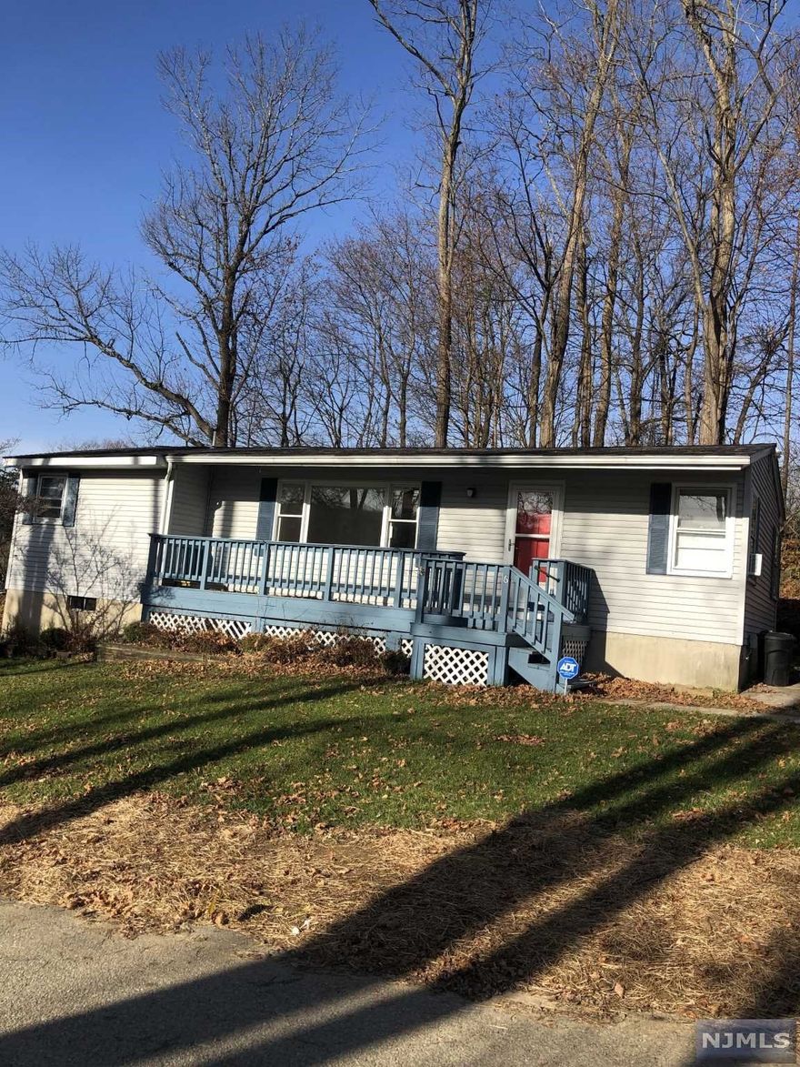 LOCATION-LOCATION-LOCATION. Gorgeous views of Lake Tranquility from a huge picture window in living room. This home is perfect as a starter home, those wishing to downsize ,or a vacation home. Kitchen and Bath have been updated and lovingly maintained. Enjoy fishing, boating, swimming, and sports