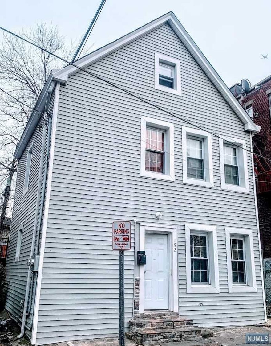 New Price and opportunity to own this renovated 2 family home offers rent roll is $3000/ Month. 1st floor unit that offers Eat in Kitchen, living room, 1 full baths and backyard access. Second floor unit offers Eat in Kitchen 4 bedrooms, 1.5 Full bathroom. Separate utilities for each unit. Basement offers1 bedroom and full bath. Updated Windows, flooring throughout and Vinyl exterior siding. A great Investment opportunity tenant occupied lease expire in August & September.