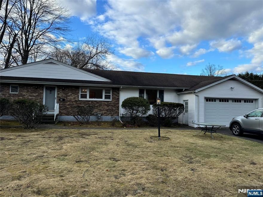 Lovely open spacious ranch house on East hill of Closter. Facing East, Hardwoods floor through out. Finished basement perfect for playroom or home office. From living room sliding doors leads to large deck. Very large attached 2 car garage and a driveway that accommodates up to 8cars park.