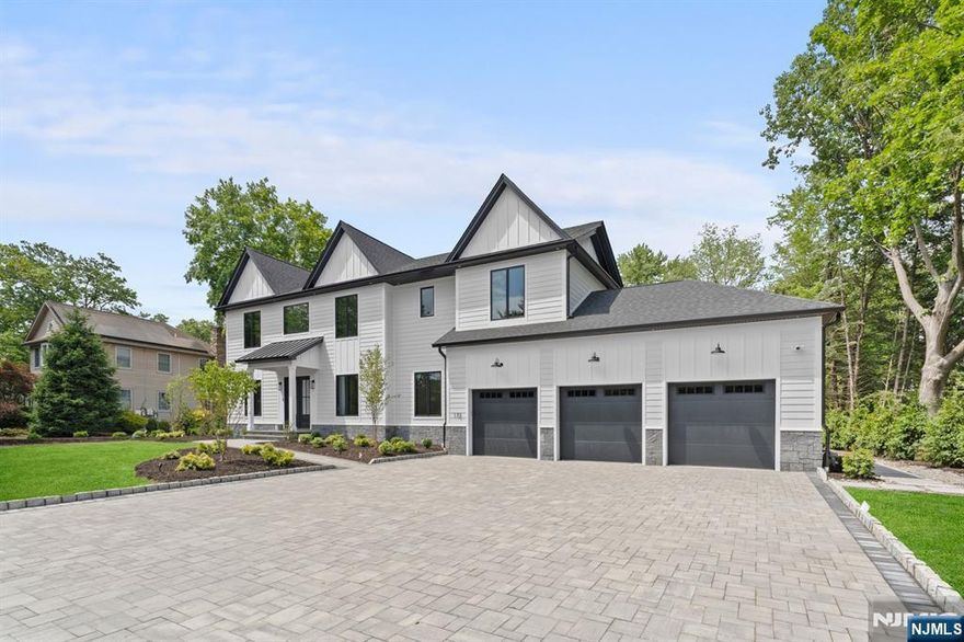 Discover refined modern luxury in this exceptional new construction Colonial set on over half an acre in desirable Old Tappan. Thoughtfully designed, this 6-bedroom, 7.5-bath home features en-suite bedrooms on both the first and second floors, soaring ceilings, sleek finishes, and wide-plank wood flooring throughout. A dramatic two-story foyer opens to a sunlit layout with a formal living room, dining room, office, powder room, and a first-floor junior suite. The chefâ€™s kitchen impresses with high-end appliances, a walk-in pantry with extra refrigerator/freezer, and a butlerâ€™s pantry with beverage fridge. The kitchen flows into a two-story family room with sliding glass doors to a partially covered patio featuring an outdoor kitchen and cabana bath. A spacious mudroom connects to the heated three-car garage, while a rear hall offers bonus pantry and laundry space with access to the cabana bathroom. Upstairs, the stunning primary suite offers two curb -less showers, a custom walk-in closet, and a tiled balcony overlooking the manicured property. Three junior suites and a beautiful laundry room complete the second floor. The finished lower level includes a rec room, wet bar, media room, gym, bedroom, and full bath. Additional amenities include radiant heat in all full baths, whole-house water filtration, built-in stair lighting, garage heating/cooling, and heated vents in the covered patio. A perfect blend of elegance, comfort, and indoor-outdoor living.