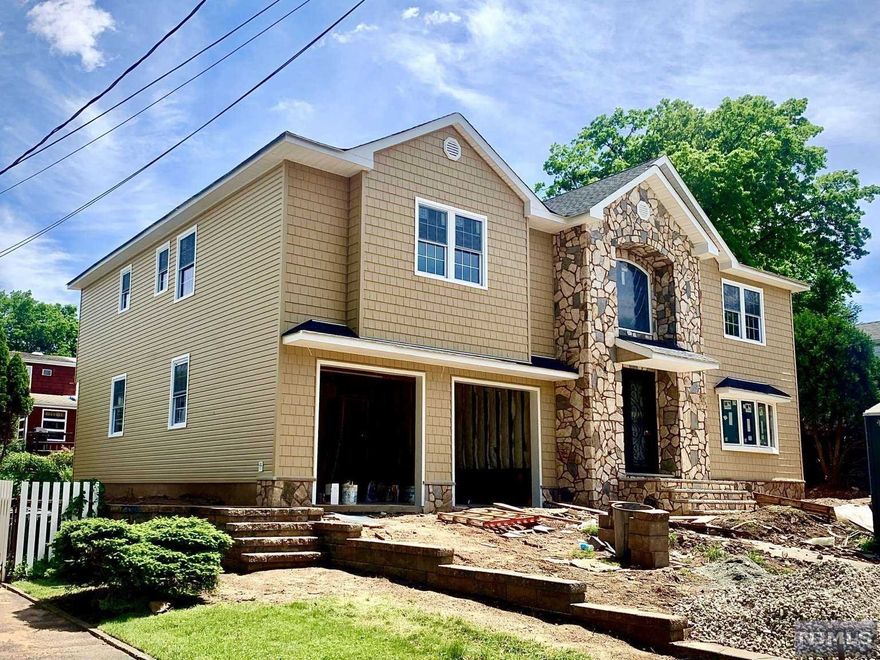 Extraordinary huge house on oversized lot located in desirable area in Hasbrouck Heights. One of a kind, custom-built large five-bedrooms, five and a half bathrooms. Thoughtfully designed open-floor-plan home that features a dramatic and elegant two-story foyer... Open kitchen with expended island/breakfast bar. Dining area will meet all your entertaining needs and desires. Sliding door from the kitchen leads to private patio with gas fired fireplace and TV... Just more space to relax and entertain... First floor also includes a luxury suit with walk-in closet and private bathroom. Second floor includes a huge master bedroom with two walk-in closets and private bathroom Just too much to list; come and see for yourself...