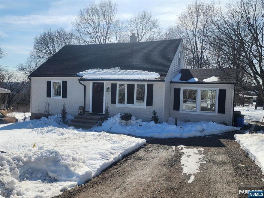 Completely renovated 3-bedroom, 2.5-bath Cape Cod in lovely established neighborhood. The main level features a first-floor primary suite, gorgeous eat-in kitchen, living room, dining room, and powder room. Upstairs offers two additional bedrooms and a full bath. Beautifully refinished hardwood floors. The finished basement provides extra living space, laundry, and ample storage. Enjoy the private deck and yard, plus an oversized detached two-car garage perfect for vehicles, hobbies, and extra storage. Owner holds a New Jersey real estate license.