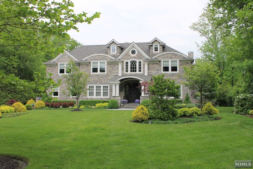 Imagine driving up to a SPECTACULAR DREAM HOME situated on a charming horseshoe st where only neighbors & guests travel & realizing you're home! This is not one of the several heavily trafficked streets on the way to/from train station/schools. This 8 yr old CUSTOM RESORT STYLE ESTATE, on almost 1 ac, is located in prestigious Short Hills, moments away to highly rated schools, parks, shopping & NYC (25 mi). As you step inside this majestic CHC, approx 10,000 sf, note the quality & beauty without being overwhelmed by its grandeur. Dramatic 2-story entry foyer, elegant appointments, dream kitchen, stunning stone wall in FR, custom built-ins, 4 FP's, 7 BR's & 7.1 Bthrms, elevator, study/office, playrm, walk out bsmt w gym & BESPOKE HOME THEATER. This SMART HOME features Control4 Automation, NEST, 6-zone HVAC, Sonos & Samsung TV's in every BR & more. STUNNING BKYD w view of woods is highlighted by a terraced Bluestone patio, outdoor speakers, outdoor kit, Gunite pool, spa, basketball.