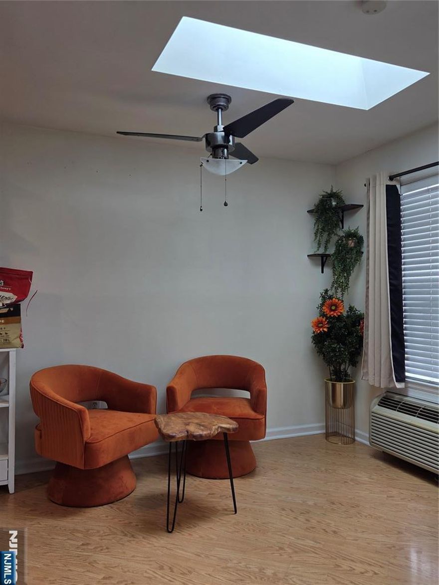 Freshly Painted Bright and open 1 bedroom unit. Open layout with skylights and high ceilings makes this unit very unique. Plenty of natural light floods the living room and eat in kitchen maklig this a warm and cozy unit. Large bedroom makes this a very desirable corner unit with a balcony. One covered parking spot conveniently located right next to the stairs. Laundry in unit. Easy access to makor highways and transportation. PETS are sllowed.