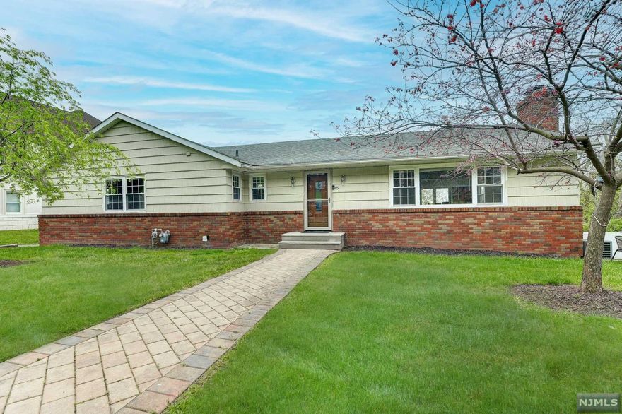 Breathtaking view surrounds this Exceptional Ranch. This is a Bright and Sunny 3 Bedrooms and 2 Baths Beautiful Ranch. One floor living at its best - a living room with a wood burning fireplace, the open concept dining room leads to the eat-in Kitchen enhanced w/granite, LG SS appliances, ample cabinets & center island, french door overlooking the private backyard with an inviting, huge deck with a beautiful view to live for. Three comfortably sized bedrooms, including a primary suite with a full bath. Plus a huge unfinished walk-out basement with endless potential and 2 car attached garages. Truly, a house to call home!