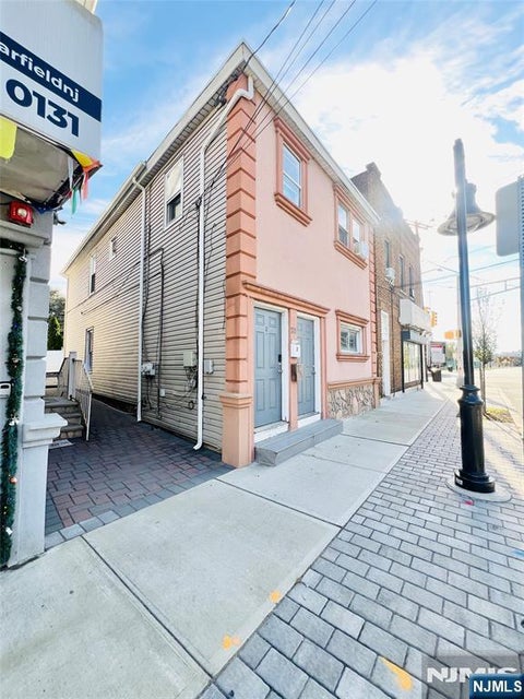 Photo of 322 River Drive, Garfield, NJ 07026 (MLS # 26041173)