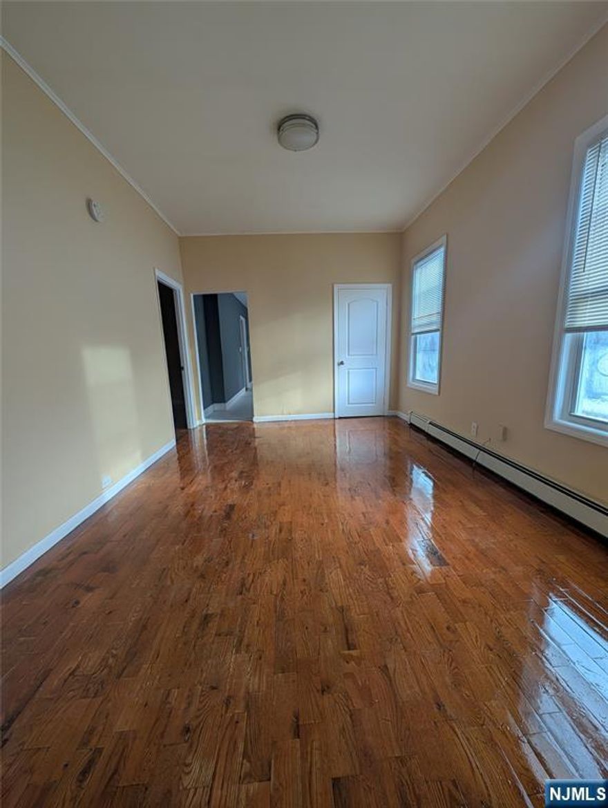 Welcome to this newly renovated 3-bedroom apartment featuring beautiful hardwood flooring throughout and generously sized bedrooms offering both comfort and functionality. The spacious eat-in kitchen provides the perfect setting for everyday meals and gatherings. Ideally located near mass transportation for an easy commute, this home is just minutes from Penn Station, downtown Newark shopping centers, NJPAC, and the Prudential Center. Conveniently situated near East Orange General Hospital and local houses of worship, everything you need is right at your doorstep. Donâ€™t miss this opportunity to live in a well-maintained, centrally located apartmentâ€”schedule your showing today!
