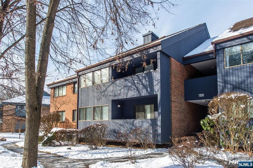 Pull right into your private garage, a high-value luxury for the area. This is a well kept updated condo where convenience meets comfort. Imagine morning coffee on your private balcony and seamless meal prep in a kitchen offering corian counters, a peninsula and a dining area. The primary suite features a walk-in closet and a private bath. A separate storage bin will help keep you organized and clutter free. This home offers the perfect home base for an active lifestyle, featuring a community pool and easy access to hiking trails at Ramapo Valley Reservation and Campgaw Mountain. Additionally you will enjoy easy access to Route 17, shopping, and the NYC train.