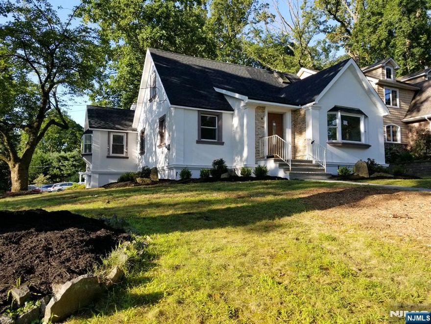 Updated, generously sized Cape Cod home situated on a corner lot in a wonderful neighborhood. Enjoy a bright formal living room and a spacious family room filled with natural light, featuring abundant windows and a cozy fireplace. The kitchen opens to a nicely sized deck, perfect for outdoor dining and relaxation. The second-floor primary bedroom includes a renovated en-suite bathroom. Hardwood floors throughout and central air conditioning complete this comfortable home. Conveniently located close to schools. Tenants are responsible for utilities and snow removal. Landlord will provide lawn care. Renters insurance is required.