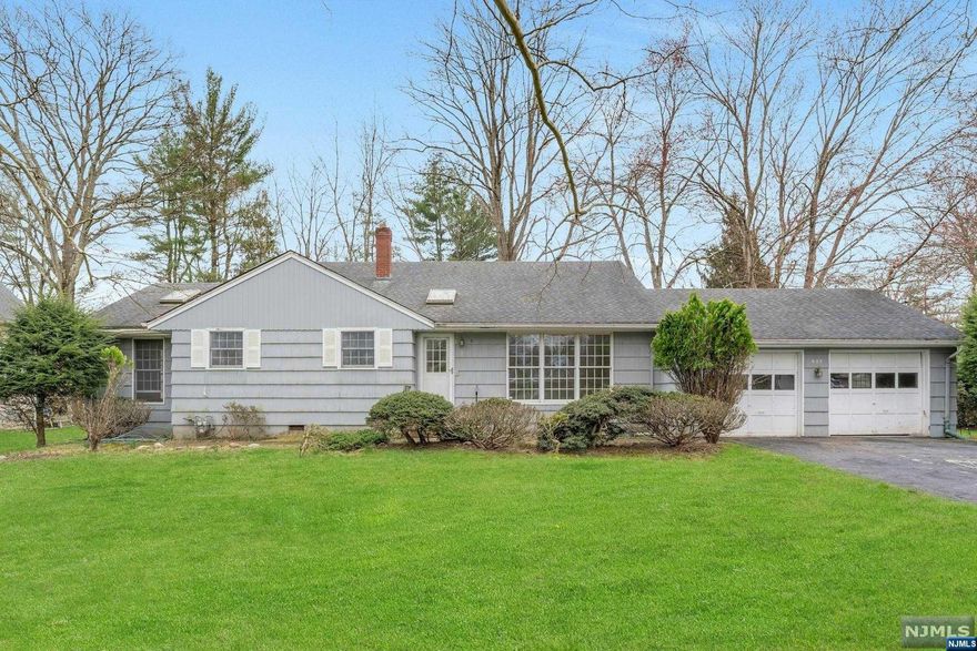 Prime Location and amazing opportunity to customize and renovate this 4 BR 3 bath situated on beautiful tree lined street on fantastic flat 150 x 124 lot in the desirable town of River Vale. Two car attached garage. Convenient to shopping, schools, parks and houses of worship. Public transportation to NYC near by Don't miss this opportunity. SOLD AS IS