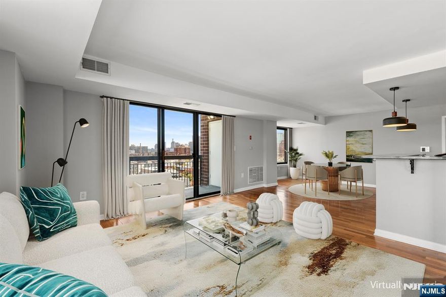 Experience luxury Hoboken living in this beautifully renovated corner unit at the sought-after Sky Club. This spacious 2-bedroom, 2-bath condo for rent features unobstructed NYC views from oversized windows, a large open-concept living and dining area, and a private terrace perfect for relaxing or entertaining. The modern kitchen is equipped with dark granite countertops, crisp white cabinetry, and high-end stainless steel appliances. Additional conveniences include central air and heating, and an in-unit washer and dryer. The expansive primary suite offers dual closets and stunning skyline views, while both bathrooms showcase floating vanities and sleek finishes. Residents enjoy a 24-hour doorman, elevators, a conference room, shuttle service to the PATH, train station, and NY Waterway ferry, as well as access to an on-site fitness center, pool, and parking for an additional fee. Pets are welcome. Located just steps from the Light Rail, grocery stores, and several daycares, this home offers a vibrant Hoboken lifestyle with top restaurants, boutique shopping, parks, and an unbeatable walkable community. ALSO LISTED FOR SALE AT $999,000.