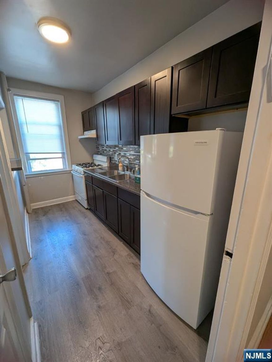 Gigantic 3rd floor 2 bedroom apartment recently gut renovated. Hardware floors throughout with modern finishes. Located steps from Queen Anne Rd. and bust routes to NYC. Rent includes heat and hot/cold water. Professionally managed with onsite super and laundry room.