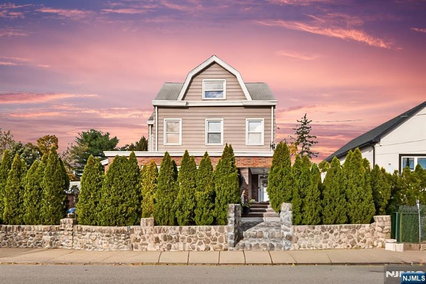 Welcome to this beautifully maintained all brick Colonial in the heart of Totowa, showcasing timeless charm blended with modern comfort. This spacious 5-bedroom, 2.5 bath home features sun filled living areas, gleaming hardwood floors, and a large kitchen ideal for gatherings. The formal dining room flows into an inviting family room perfect for relaxing or entertaining. Upstairs, generously sized bedrooms include a bright primary suite with ample closet space. A full basement, walk up attic, and detached two car garage offer added versatility. Conveniently located near Routes 46, 80, and 23, with easy access to shopping, dining, parks, top-rated schools, and the Wayne Transit Center for effortless NYC commuting.