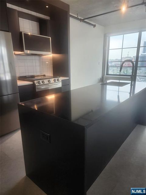 Photo of 65 Mcwhorter St #810, Newark, NJ 07105 (MLS # 25025735)