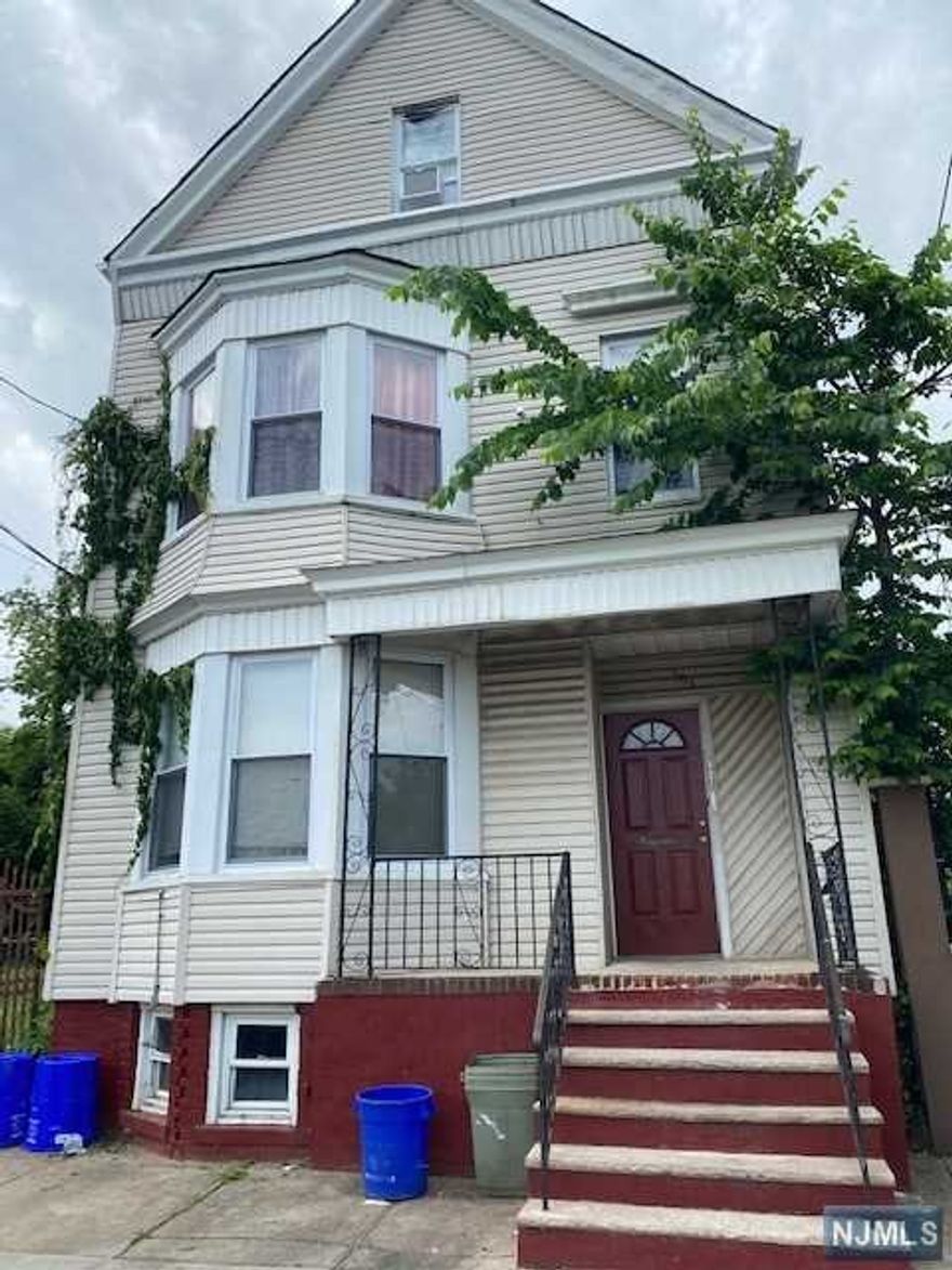 Turnkey investment or great home to live in with good income. 3 family with new roof, new windows separate utilities with forced hot air in each unit . Hardwood floors and tiled kitchens and baths. Fenced property