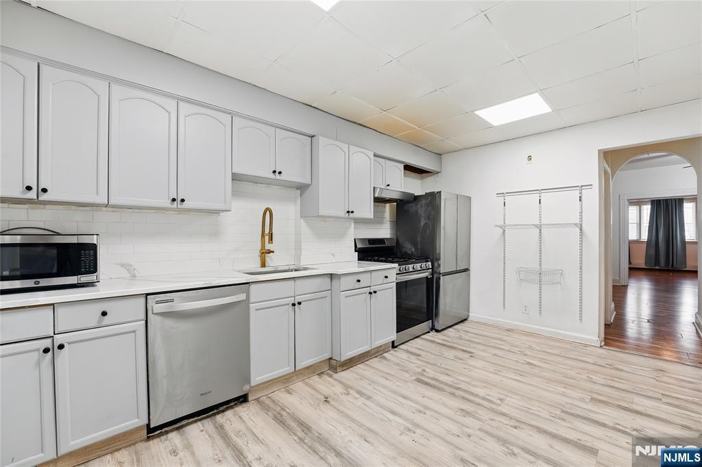 Property for Sale at 26 W 51st Street, Bayonne, New Jersey - Bedrooms: 8 
Bathrooms: 3 
Rooms: 21  - $799,000