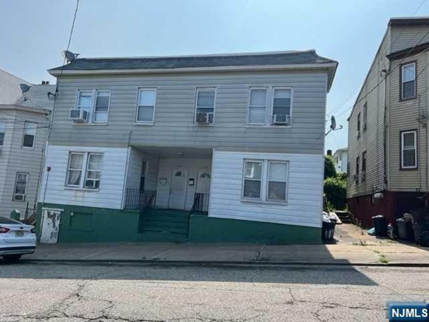 Great Investment Opportunity! This Large 4 Family Home Features Left side 1st floor unit Eat-in-kitchen, Living room, 2 Bedrooms & Full Bath, 2nd Floor left side unit Eat-in-kitchen, Living room, 4 Bedrooms & Full Bath, Right side 1st floor unit Eat-in-kitchen, Living room, 2 Bedrooms & Full Bath, 2nd Floor right side unit Eat-in-kitchen, Living room, 4 Bedrooms & Full Bath. All Separate Utilities. Close to Shopping, Major Highways & Transportation, Home is being Sold in AS IS condition.