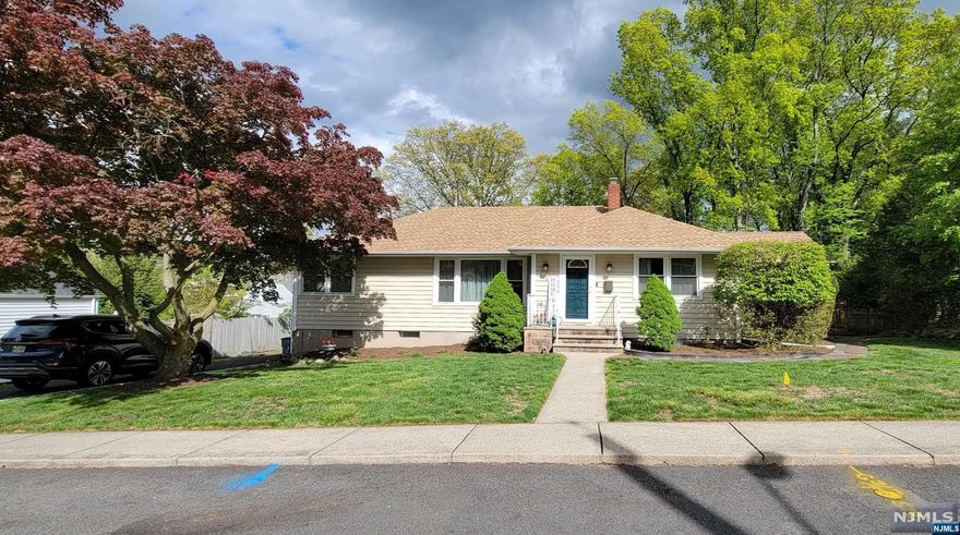 This charming 3 bedroom, 2 bath Ranch home is located on a quit street in the well sought-after town of Waldwick. Great curb appeal welcomes you inside this sun-filled home featuring a large bright living room, dining room, kitchen, updated screened porch, three first floor bedrooms and full bath. Downstairs you enter into a recently renovated basement. Great large space is perfect for play area or media room. Full washroom, office space, laundry room and second full bath.. Additional bonus space with laminate floors makes a great gym, studio or additional living space, with entrance from outside. New water tank (2021), New Vinyl Siding, Roof (2019), Asphalt Driveway (2021), Newer Vinyl Windows and French Drains, Culligan Water filtration system for drinking and whole house water softener. Large backyard, deck with recently renovated charming shed for storage. Great location that is close to train, houses of worship, town pool, shopping, & award-winning schools.