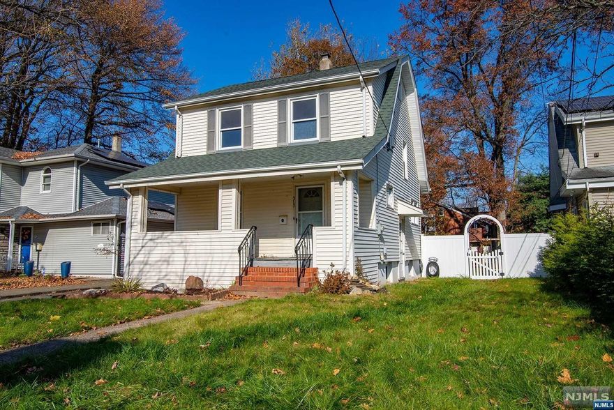 Welcome to this charming, south facing colonial featuring an open front porch which leads in to the light filled living room and formal dining room. A younger roof, hardwood floors, an oversized garage, newer fencing and a deep yard are just some of the amenities. This is a great opportunity to buy a house with low taxes within minutes to New York City. Hurry!